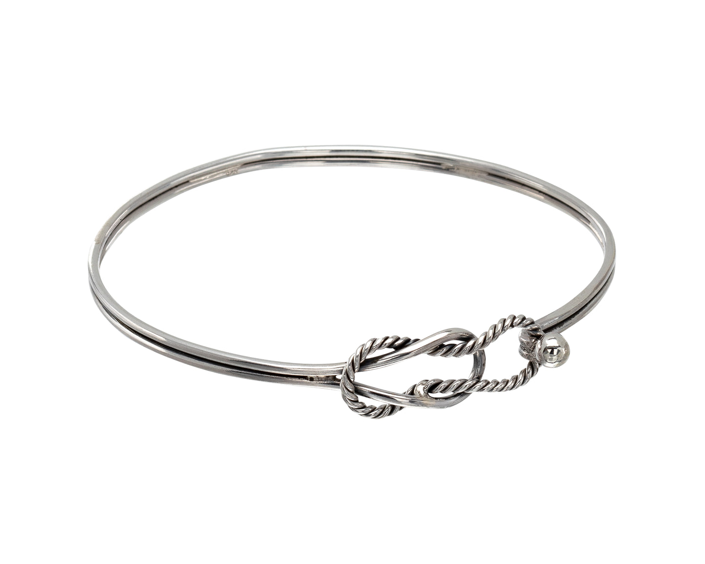 A sterling silver bracelet featuring a Celtic knot pattern with a rope design.
