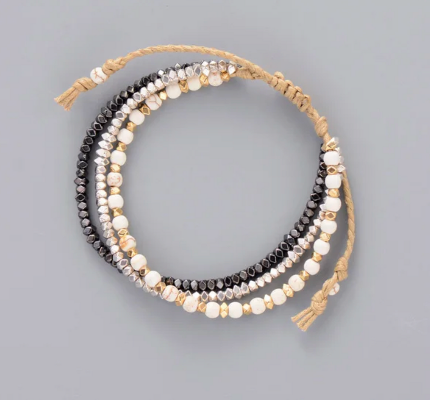 White & Black Metallic Beaded and White Howlite Adjustable Three Strand Bracelet