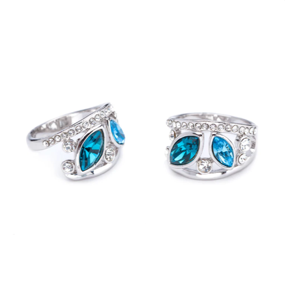 Swarovski crystal statement ring with bold blue marquise stones and clear accents on rhodium-plated wide band side view