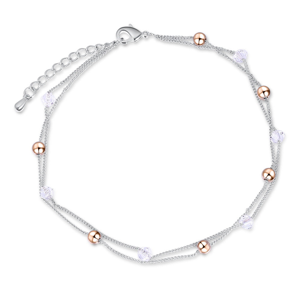Silvertone champagne goldtone anklet with mixed metal beads and Swarovski crystals, featuring a dual-chain design and a secure lobster clasp.