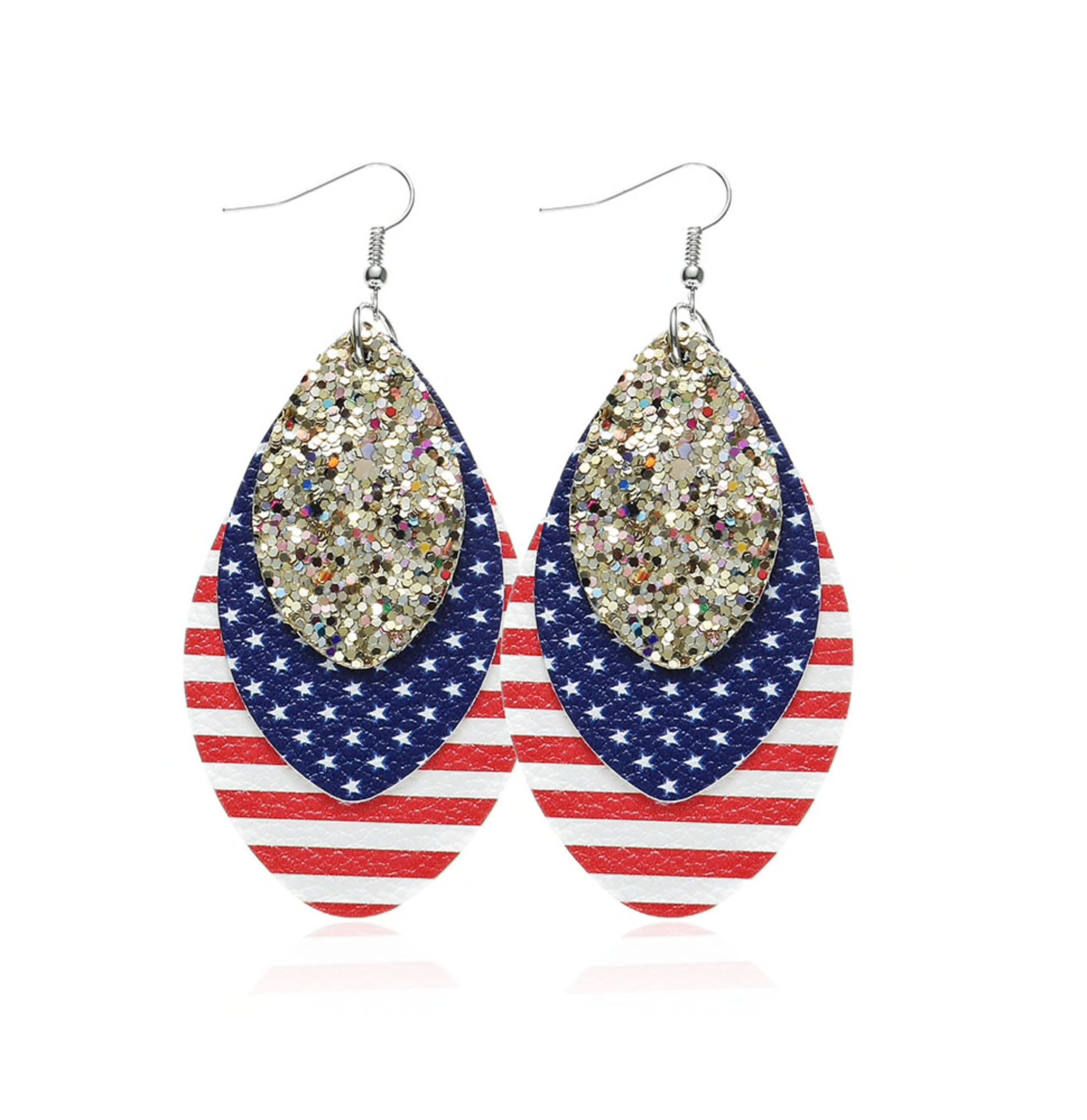 Red and white striped leaf earrings layered with blue and gold glitter pieces