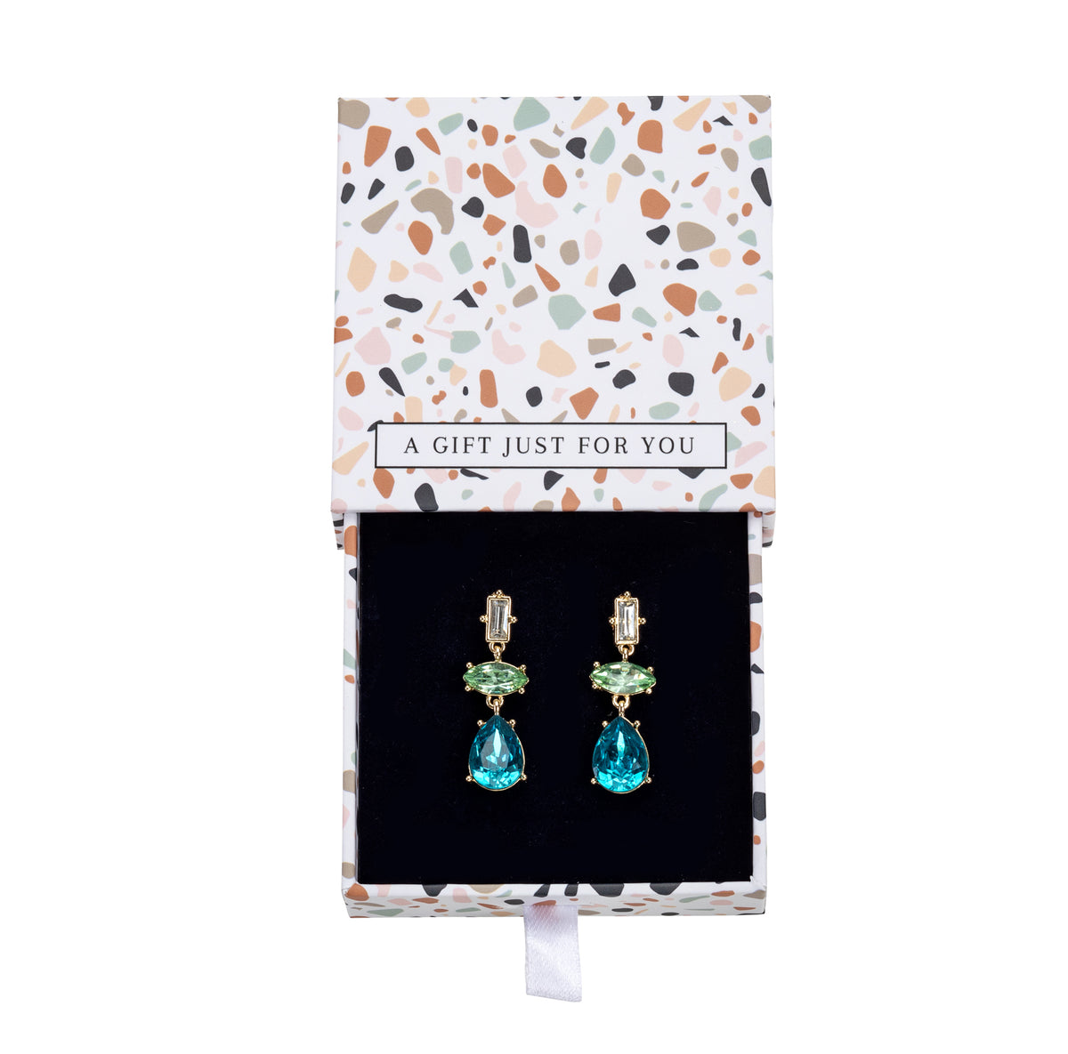 Front view of blue and green crystal drop earrings in an open patterned gift box