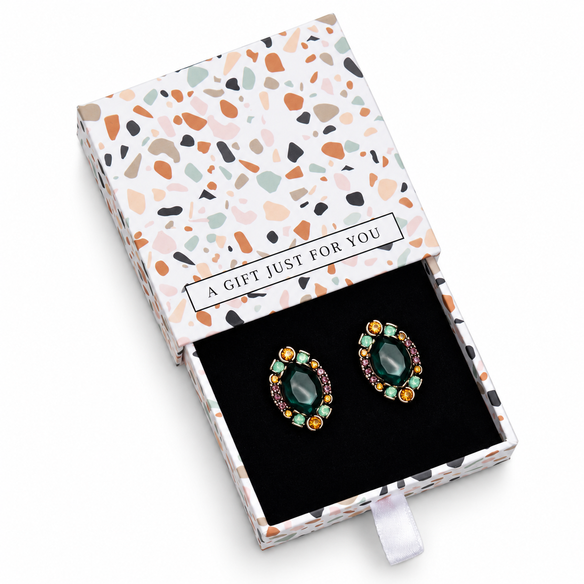 Green and multicolour crystal stud earrings in a gift box on a white background