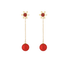 Gold-tone red snowflake chain drop earrings, full-length front view