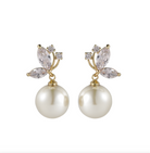 Gold-tone earrings with white faux pearl drops and clear cubic zirconia leaf studs