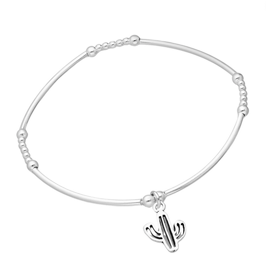Sterling silver tube-and-bead bracelet with a small dangling cactus charm, slip-on minimalist women’s jewellery.