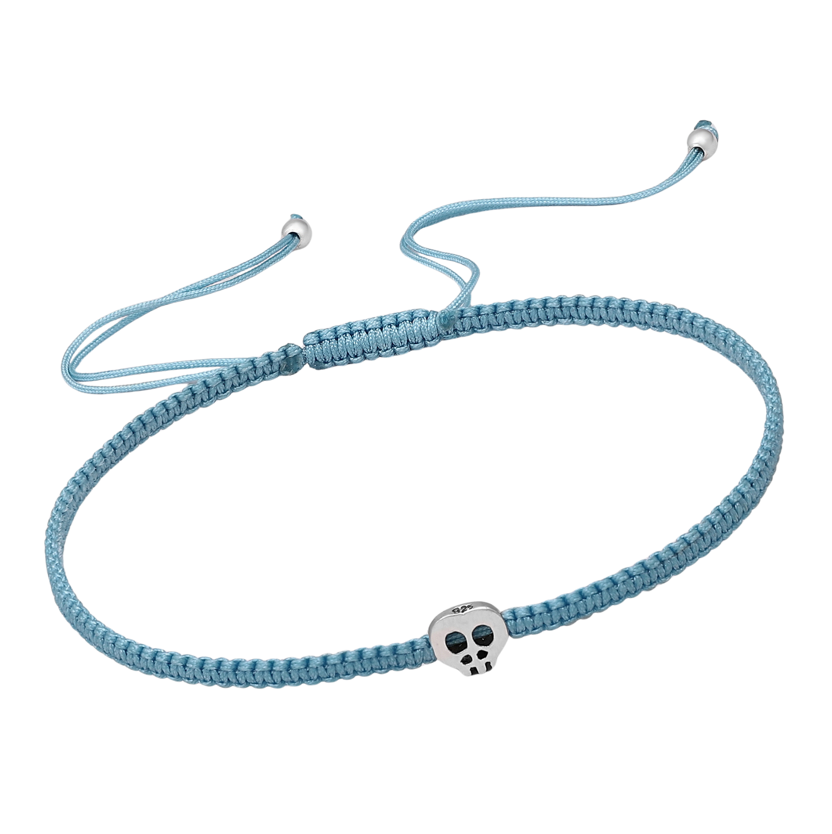 Blue macramé cord bracelet with a small sterling silver skull bead and adjustable slider, minimalist unisex jewellery.