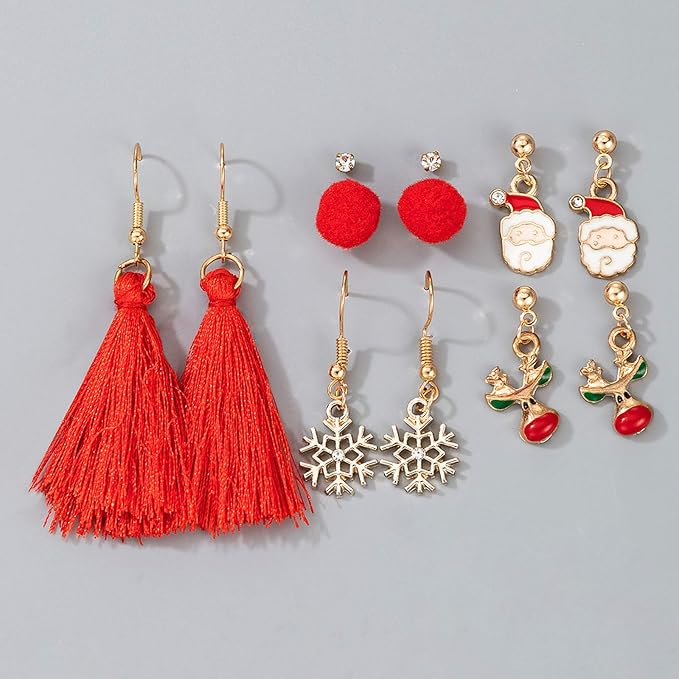 Red tassel and Christmas charm earring assortment on a white display block