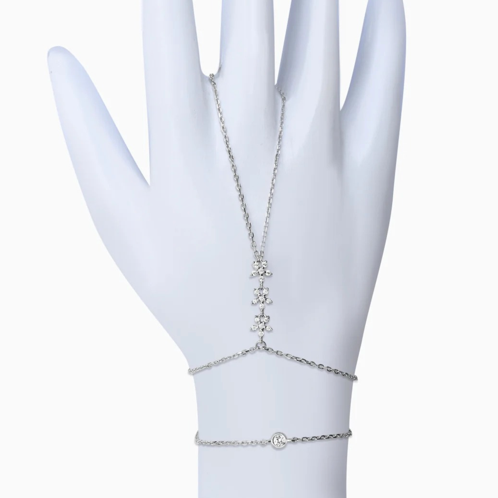 sterling silver hand chain bracelet (ring to wrist) with pavé CZ cluster and bezel-set stone on an adjustable rhodium-plated chain