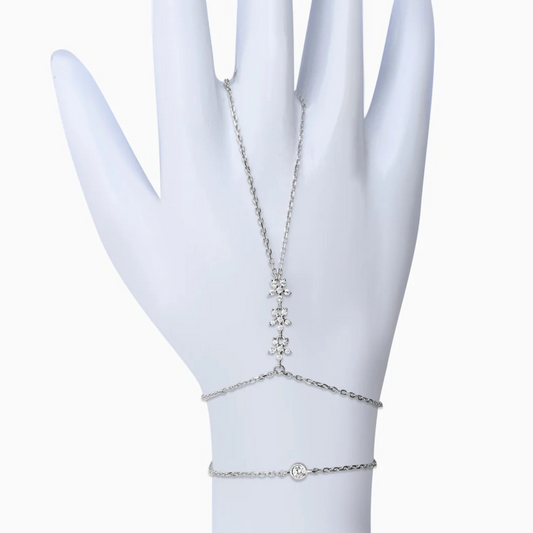 sterling silver hand chain bracelet (ring to wrist) with pavé CZ cluster and bezel-set stone on an adjustable rhodium-plated chain