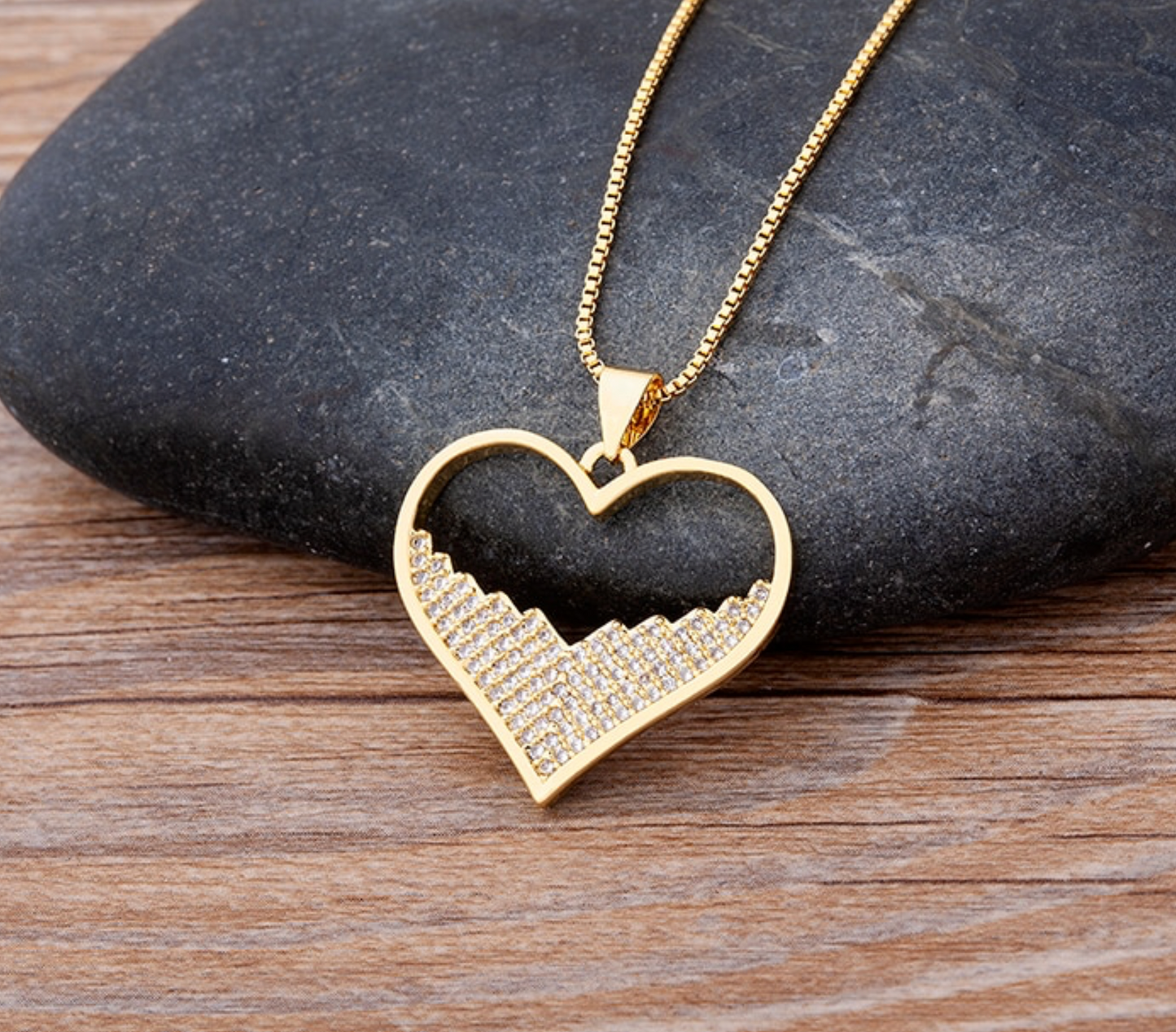 Goldtone Heart Pendant Necklace With Half Cubic Zirconia In Clear