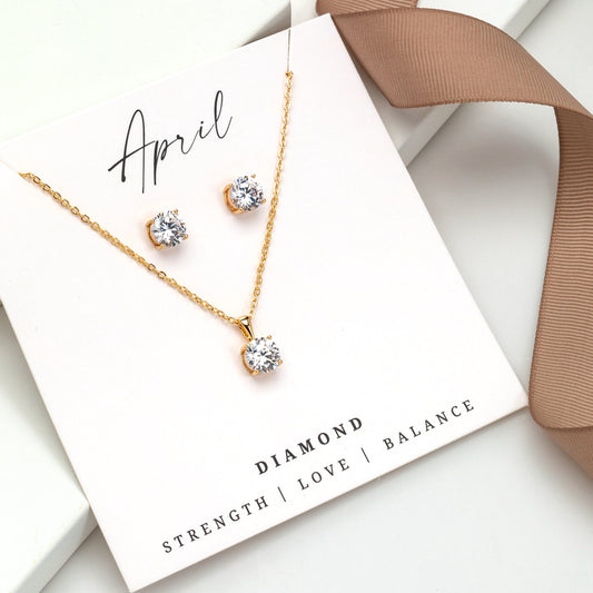 Gold-tone CZ birthstone necklace and earring set with clear diamond-look stones – April jewelry gift set.