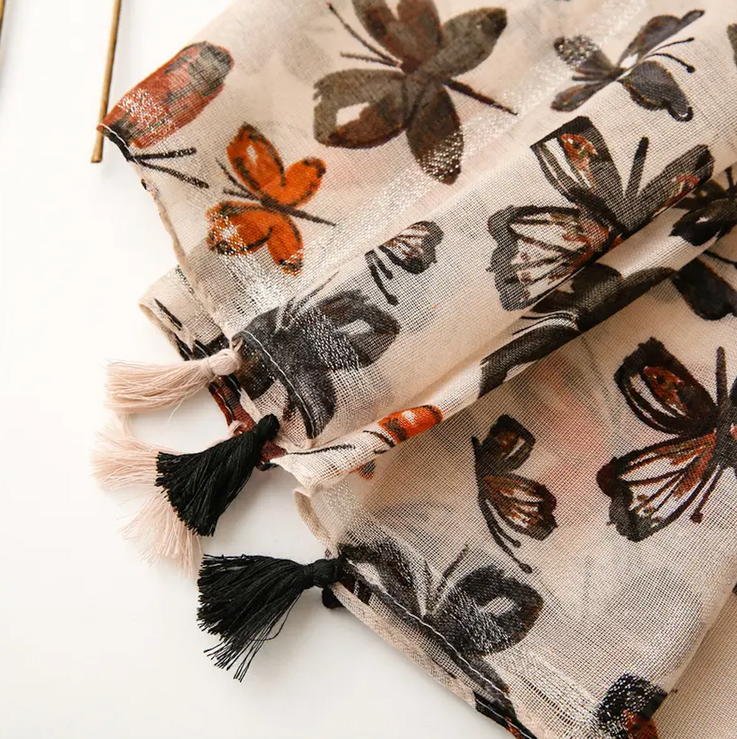 Nature-inspired Beige Butterfly Scarf with Tassels