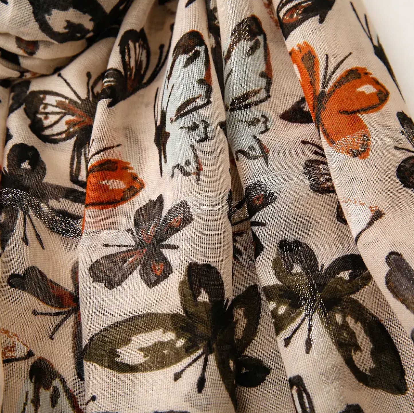 Nature-inspired Beige Butterfly Scarf with Tassels