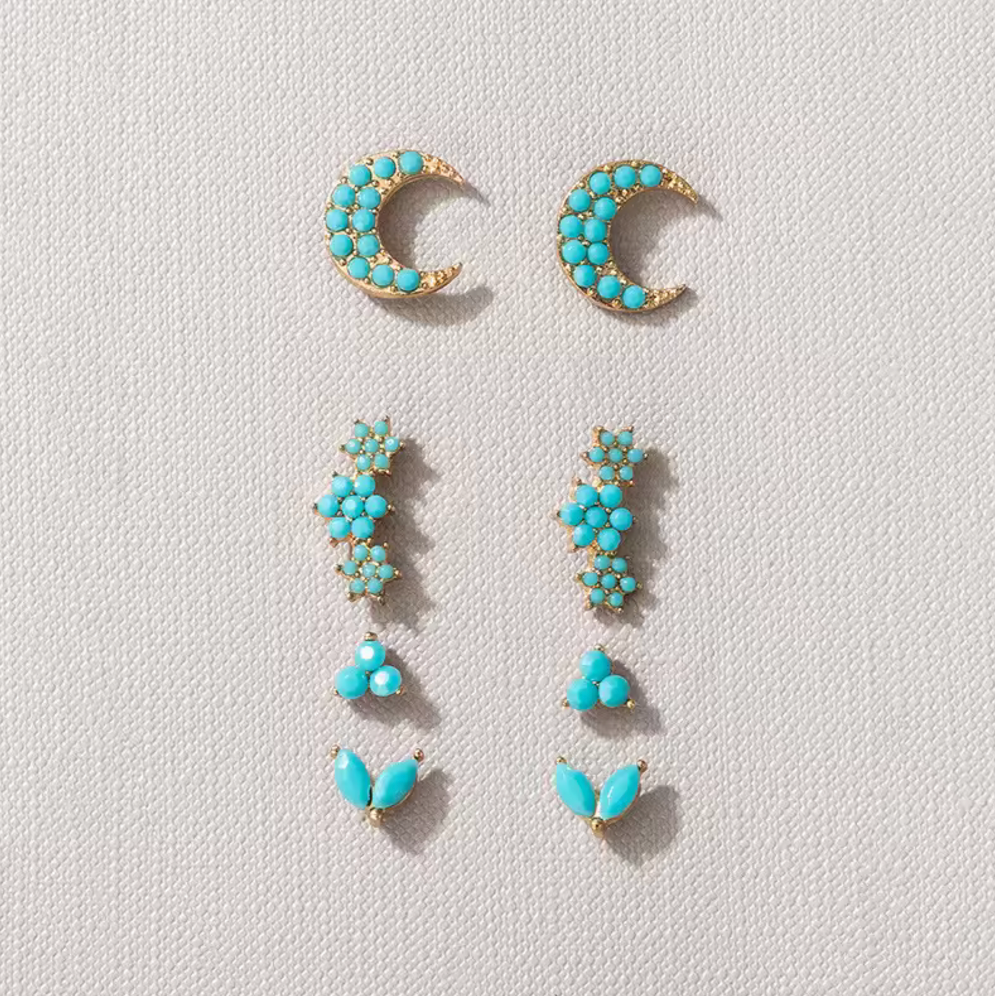 Goldtone Turquoise Crescent Moon Triplet Set Of 4 Stud Earrings