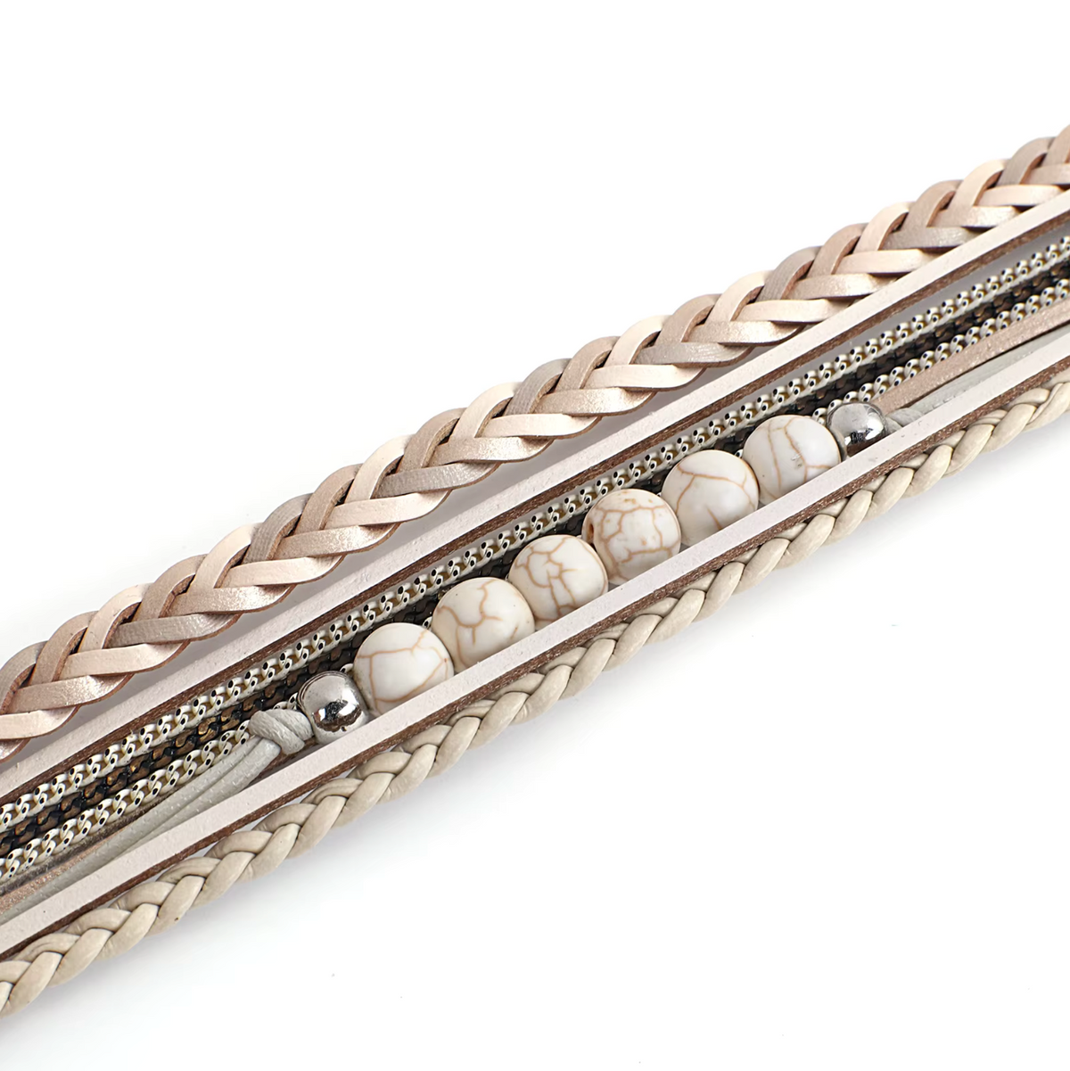 Close-up of braided strands and white marbled beads on a faux leather bracelet
