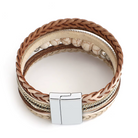 Side view of a sand and white wrap bracelet with a silver-colored clasp