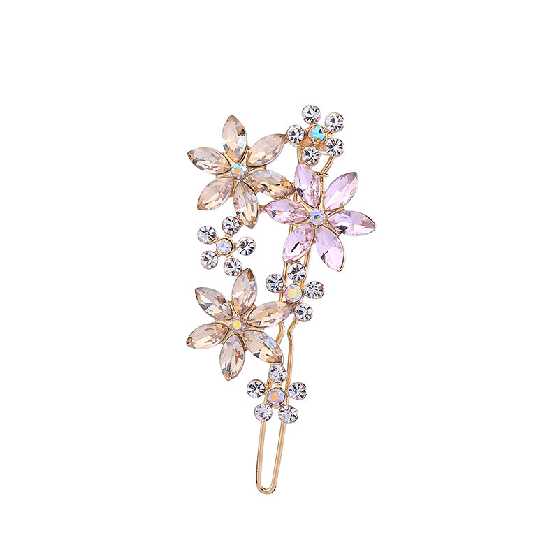 Pastel pink and champagne-coloured crystal flower hair pin, full-length view