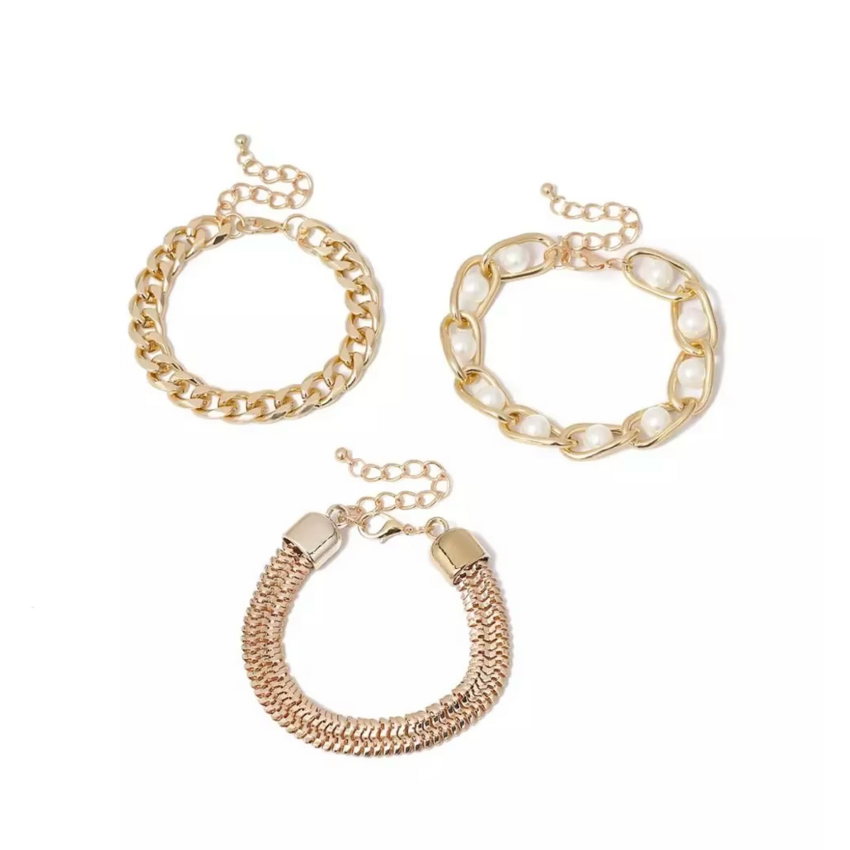 Three gold-tone bracelets displayed separately, with curb links, faux pearls and layered strands