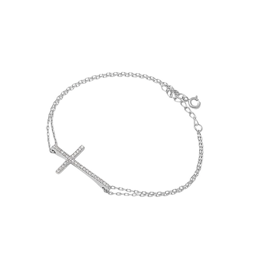 Sterling silver bracelet with a cross charm on a white background