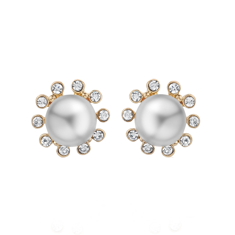 White faux pearl stud earrings framed by clear crystal petals