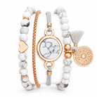 White howlite bracelet set with rose gold-tone chain, heart, tassel and round marbled centre