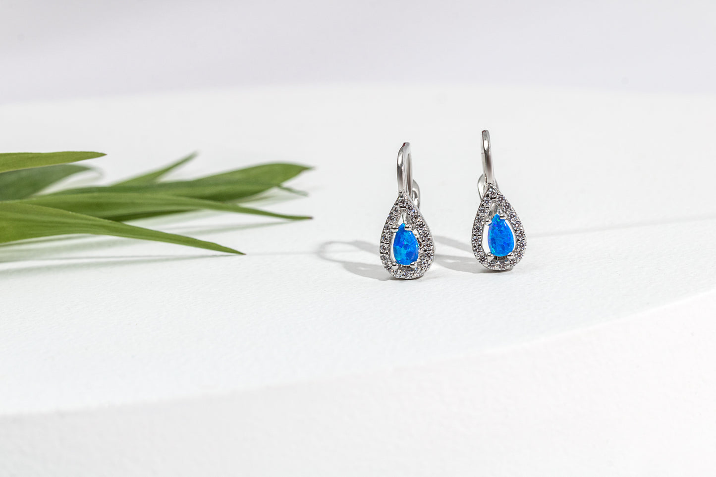 Sterling Silver Teardrop Huggie Earrings with Blue Lab-Created-Opal