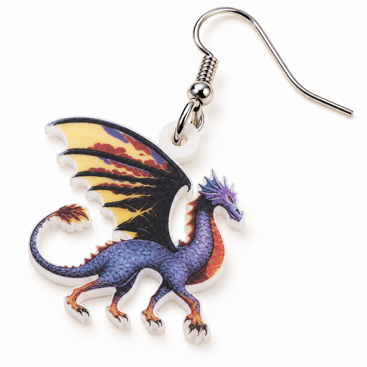 Close-up of printed purple dragon acrylic charm with yellow wings and silver-tone hook