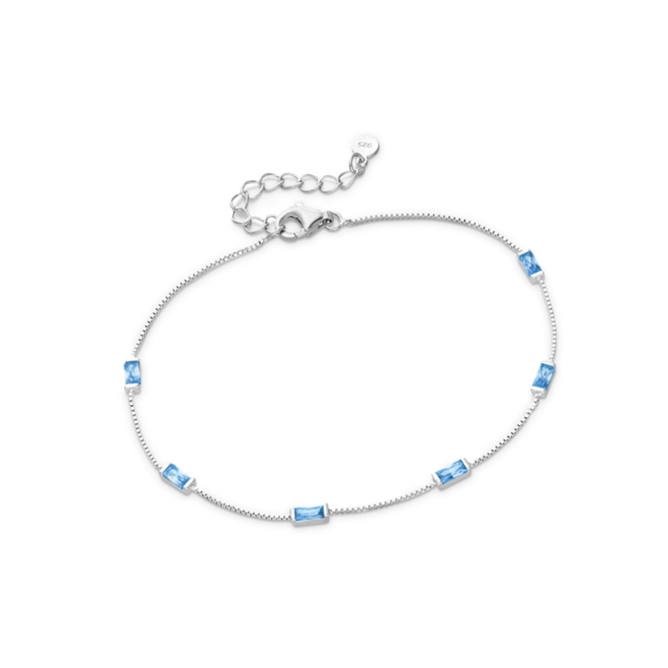 sterling silver baguette gemstone station bracelet with bezel settings on an adjustable chain in aqua