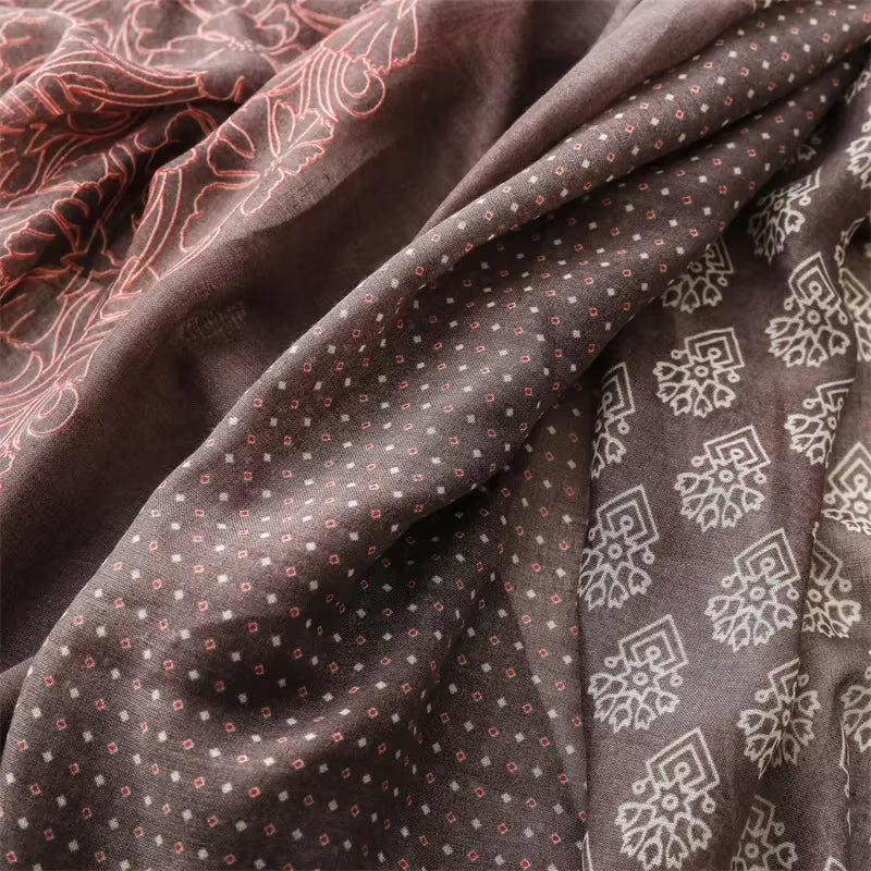 Elegant Multi-Pattern Tassel Scarf in Earthy Tones