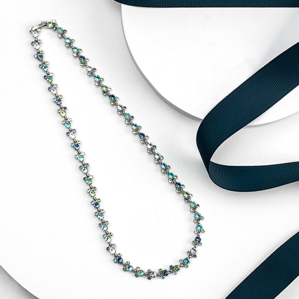Swarovski crystal floral necklace with blue and green sparkle, rhodium-plated, elegant jewelry for weddings, gifts, and special events