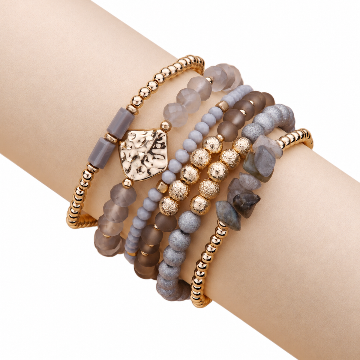 Grey Goldtone Beaded Bracelet Set Of 6 on a neutral display roll against a white background