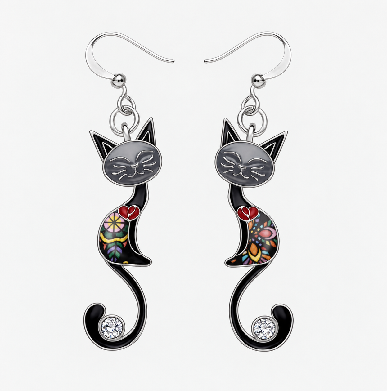 Black mosaic cat earrings showing distinct left and right designs