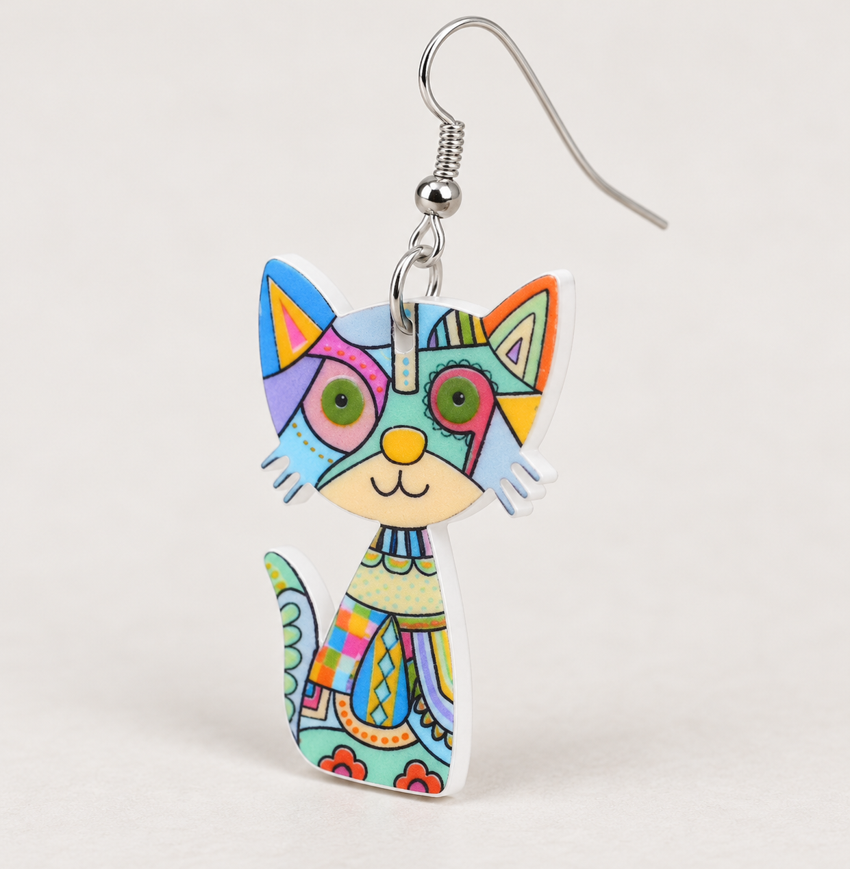 Blue multicolour cat earring detail showing printed acrylic charm