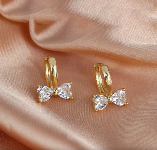 Goldtone Huggie Hoop Earrings With Crystal Bow