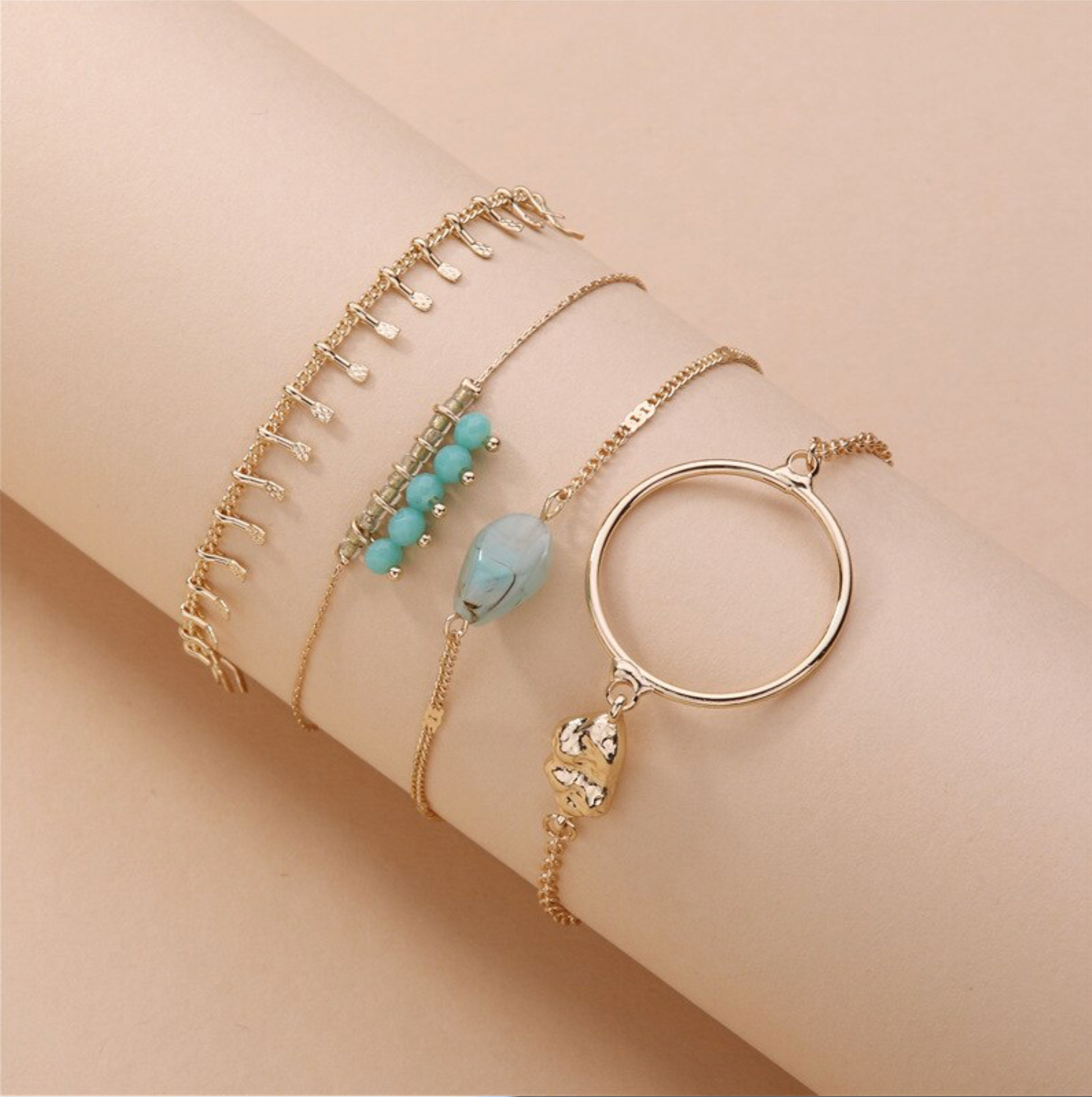 Set Of 4 Dainty Goldtone Bracelet With Teal Beads And Natural Stone